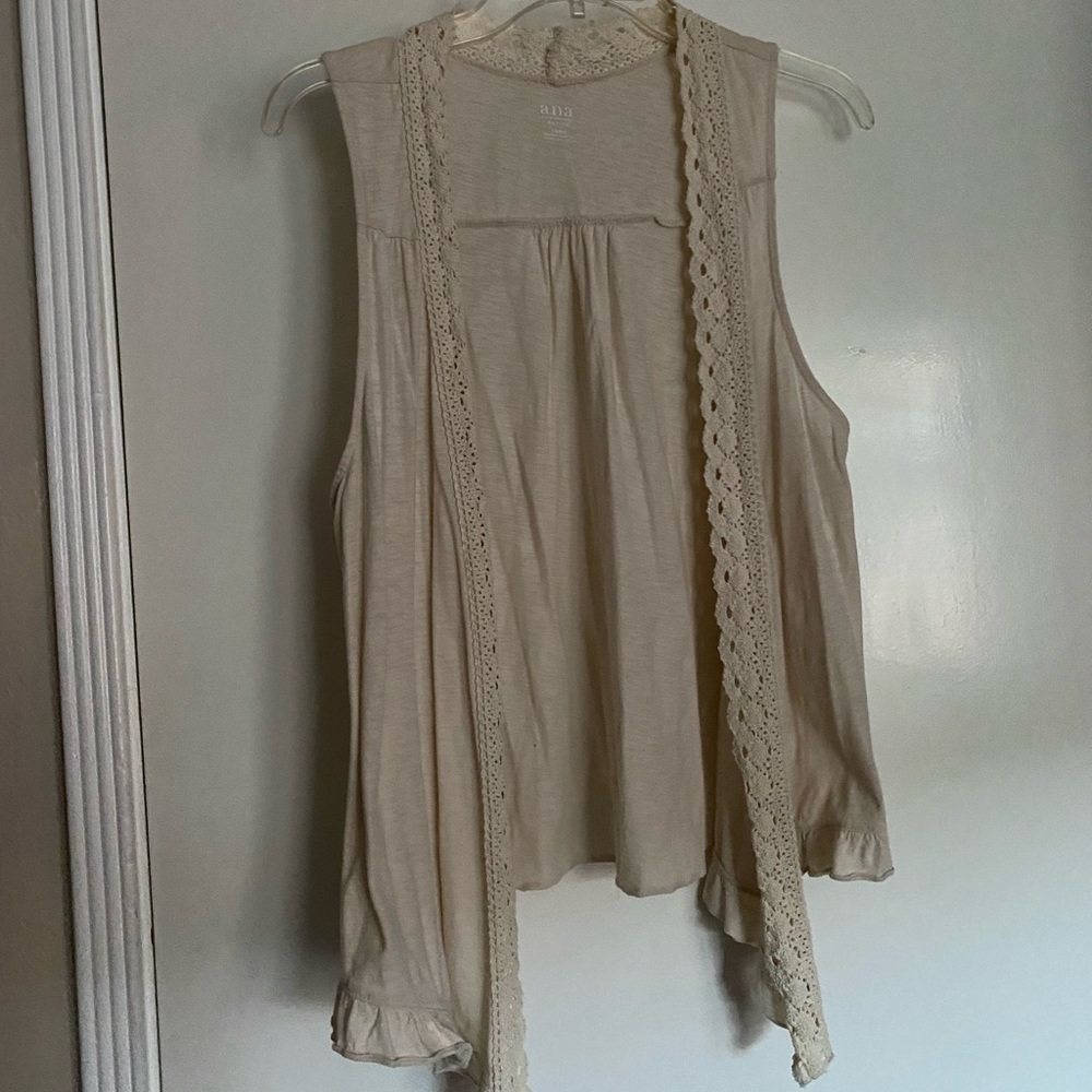 cream vest with trimming